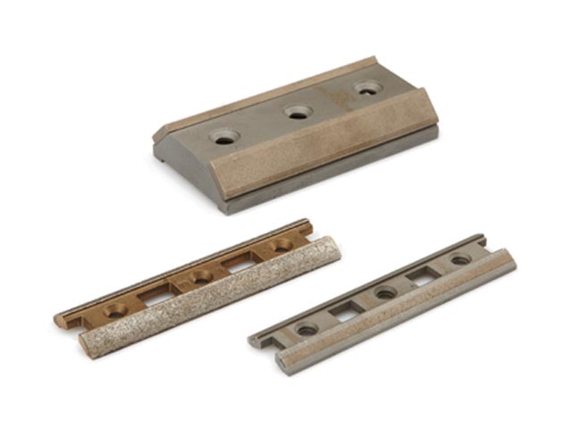 Guide shoes with diamond inserts